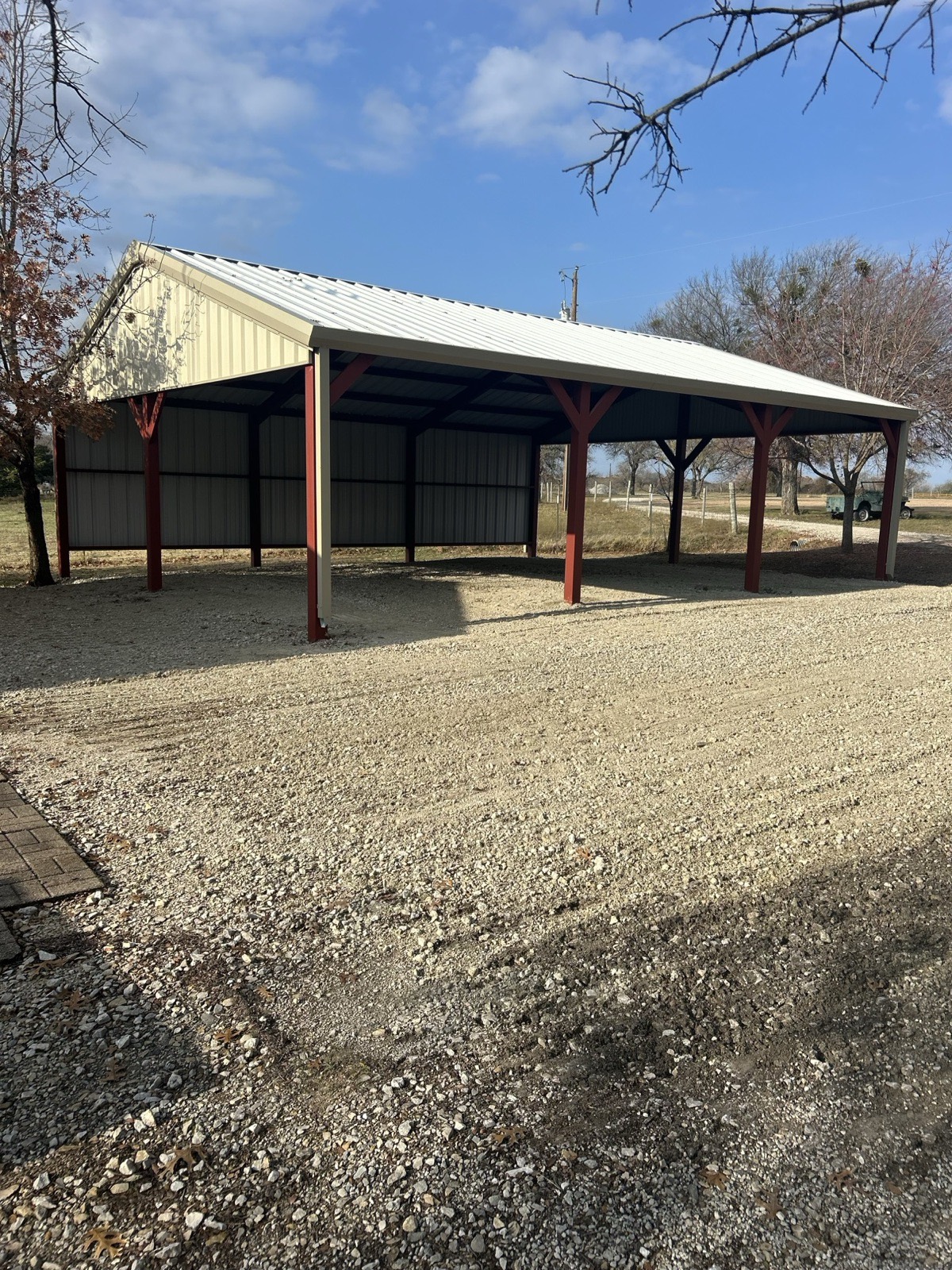 Steel building with a covered carport in North Texas